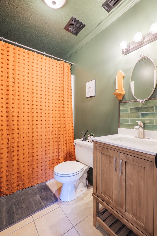 full bathroom with vanity, ornamental molding, tile patterned flooring, backsplash, and visible vents