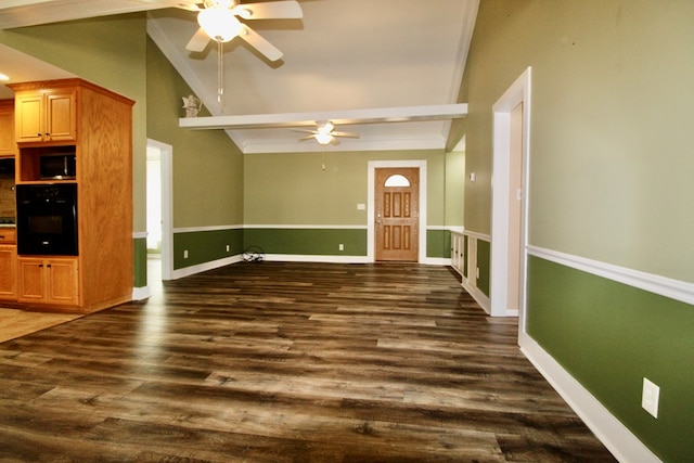 interior space featuring lofted ceiling with beams, ceiling fan, and dark hardwood / wood-style flooring