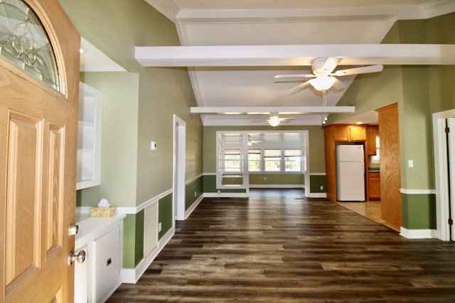 foyer featuring dark wood-type flooring, lofted ceiling with beams, and ceiling fan