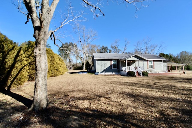 view of front of home featuring covered porch