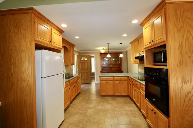 kitchen featuring hanging light fixtures, ornamental molding, kitchen peninsula, and black appliances