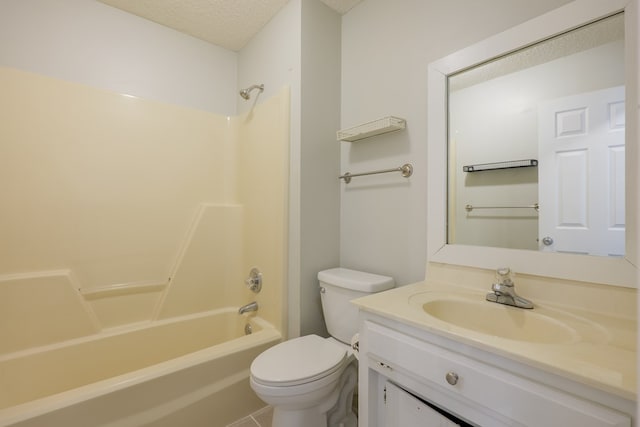 bathroom with  shower combination, a textured ceiling, toilet, and vanity