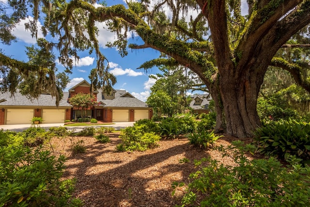 4059 Live Oaks Cir, Valdosta, GA 31601 - view of front of property with a garage, brick siding, and concrete driveway