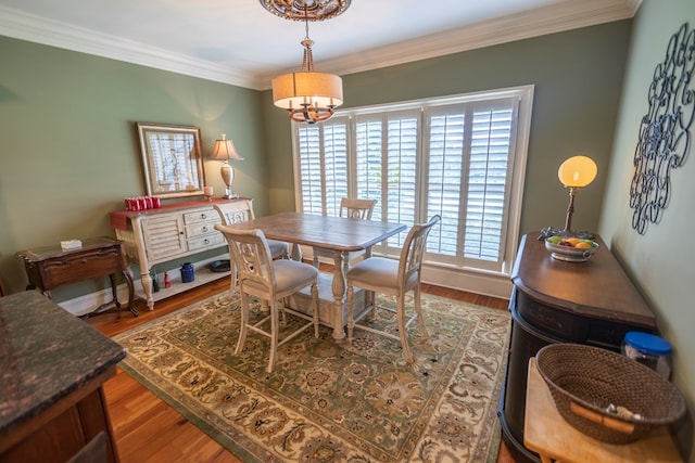 4059 Live Oaks Cir, Valdosta, GA 31601 - dining area with ornamental molding and wood finished floors