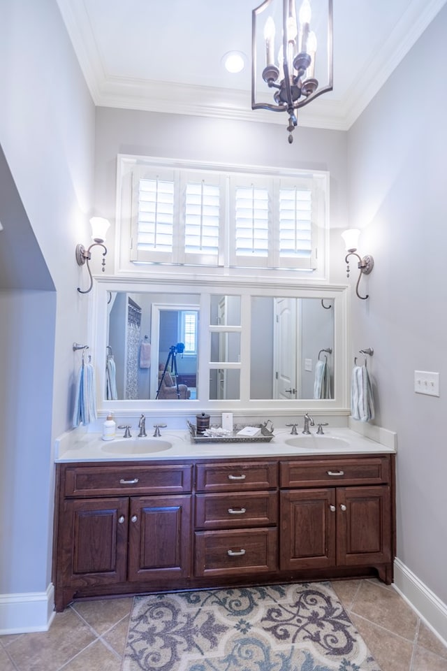 4059 Live Oaks Cir, Valdosta, GA 31601 - bathroom featuring double vanity, a chandelier, tile patterned flooring, and ornamental molding