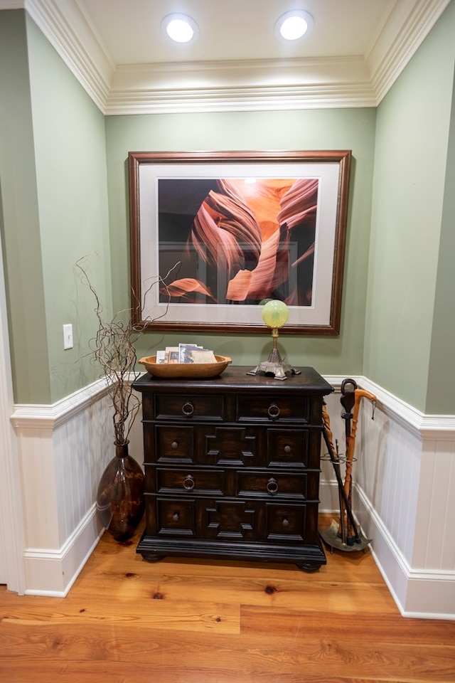 4059 Live Oaks Cir, Valdosta, GA 31601 - detailed view of wainscoting, wood finished floors, and ornamental molding