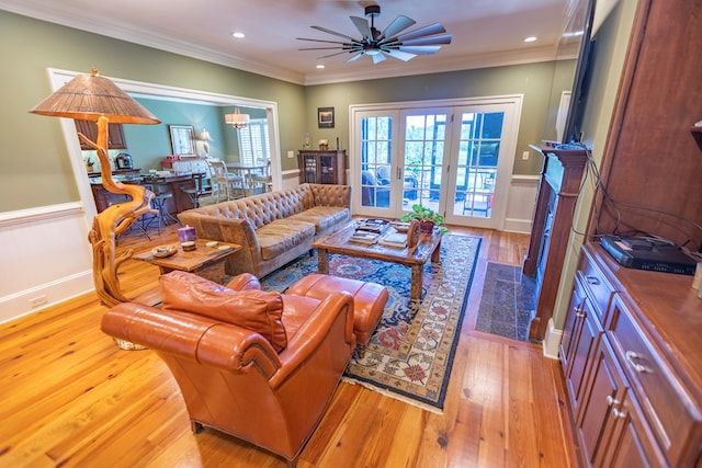 4059 Live Oaks Cir, Valdosta, GA 31601 - living room featuring wainscoting, crown molding, ceiling fan, light wood-type flooring, and recessed lighting