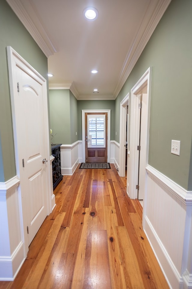 4059 Live Oaks Cir, Valdosta, GA 31601 - hall featuring a wainscoted wall, crown molding, light wood-style flooring, and recessed lighting