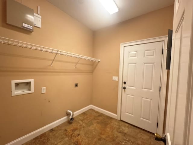 washroom with baseboards, hookup for an electric dryer, hookup for a washing machine, and laundry area