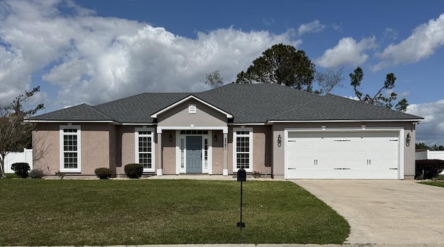 single story home with stucco siding, driveway, a front lawn, roof with shingles, and an attached garage