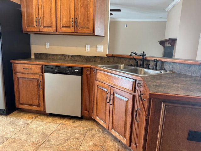 kitchen with a sink, dark countertops, dishwasher, and ornamental molding