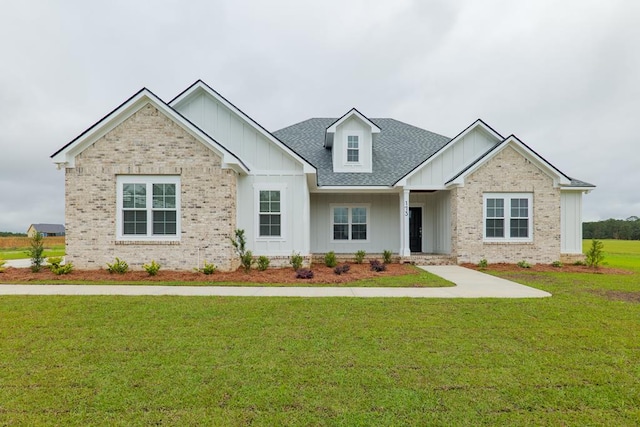 craftsman inspired home with a front yard