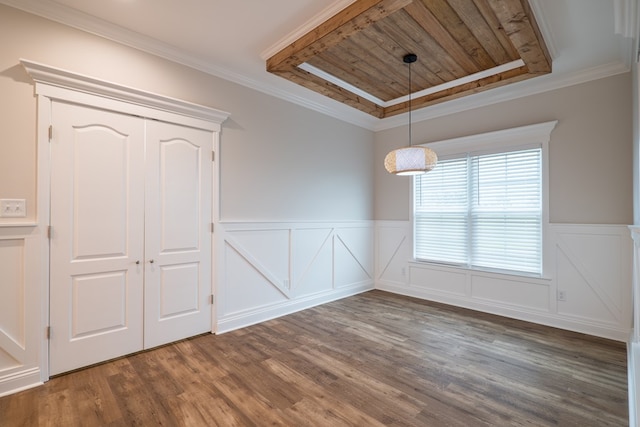 unfurnished dining area featuring wooden ceiling, dark hardwood / wood-style flooring, a tray ceiling, and ornamental molding