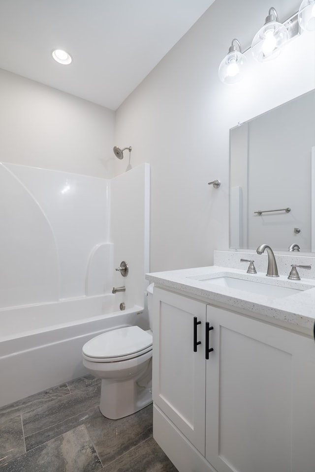 full bathroom with vanity, toilet, and shower / bath combination