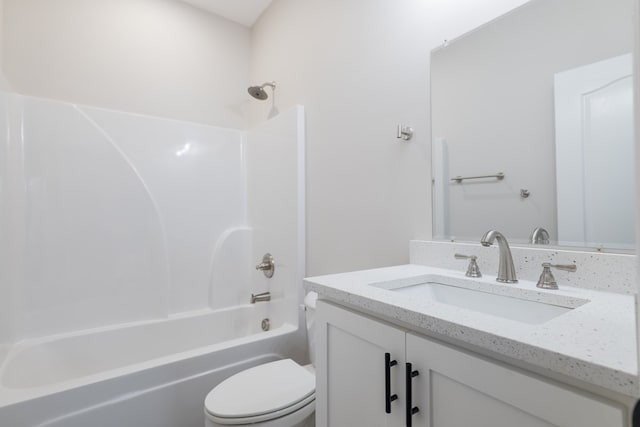 full bathroom with vanity, shower / bath combination, and toilet