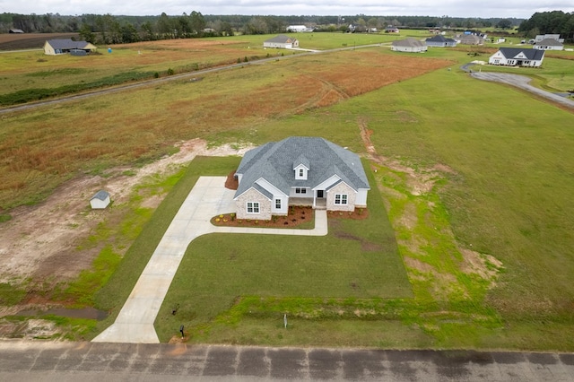 bird's eye view with a rural view