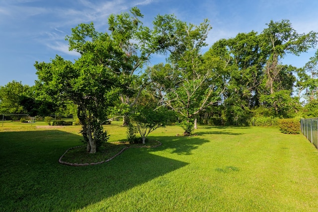 view of yard with fence