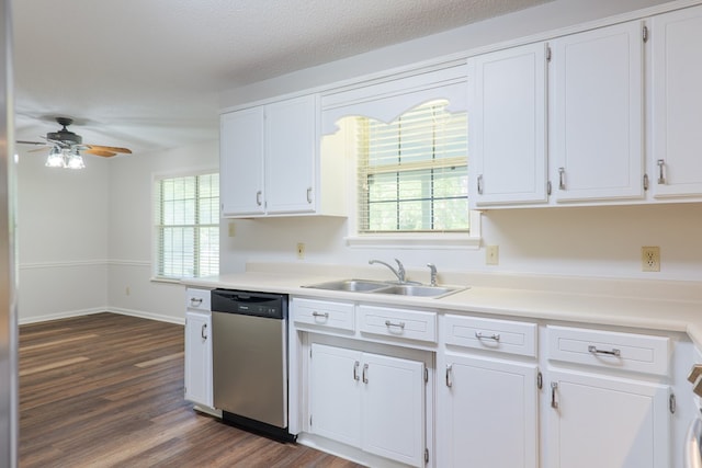 kitchen with stainless steel dishwasher, a sink, white cabinetry, and dark wood-type flooring