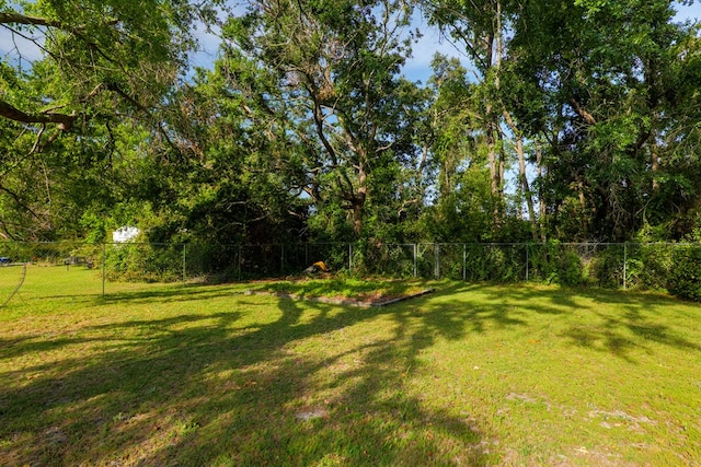 view of yard with a fenced backyard