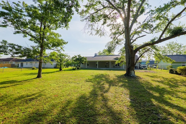 view of yard with fence