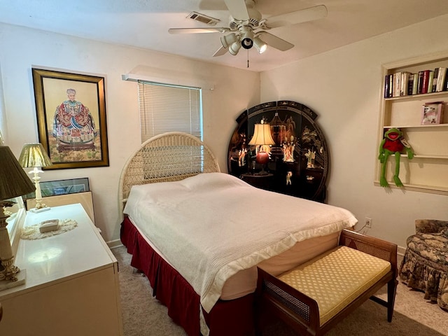 bedroom with ceiling fan and carpet flooring