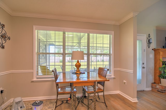 4121 Amberley Trl, Valdosta, GA 31602 - dining space featuring wood finished floors and ornamental molding