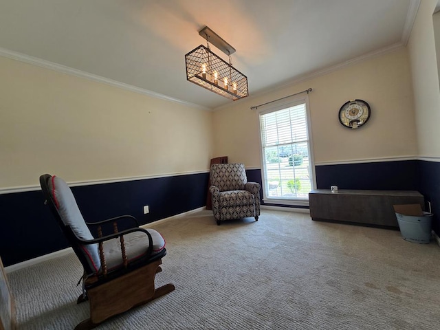 living area featuring carpet floors, a notable chandelier, baseboards, and crown molding