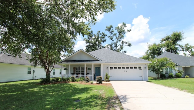 5300 Hidden Oaks Blvd, Lake Park, GA 31636 - single story home featuring an attached garage, covered porch, a front yard, board and batten siding, and driveway