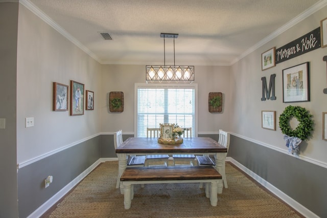 5300 Hidden Oaks Blvd, Lake Park, GA 31636 - dining room featuring ornamental molding, a textured ceiling, and carpet floors