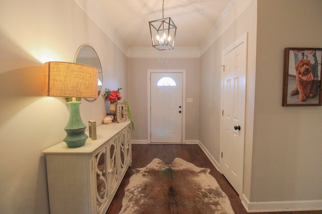 5300 Hidden Oaks Blvd, Lake Park, GA 31636 - entrance foyer with dark wood-style floors and a chandelier