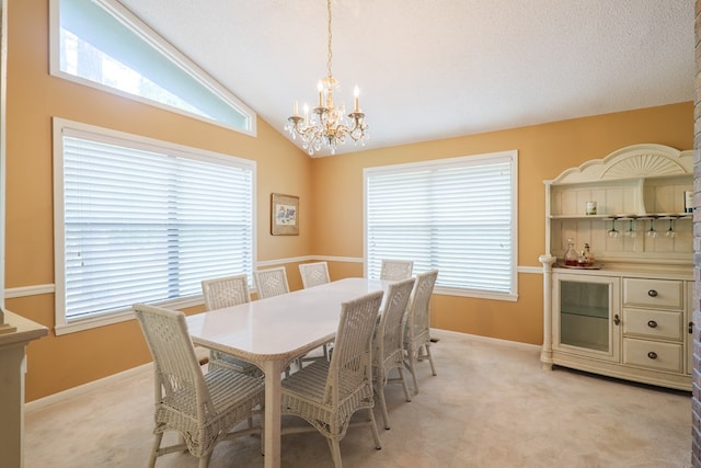 3564 River Chase Dr, Valdosta, GA 31602 - dining space with a chandelier, light carpet, lofted ceiling, and healthy amount of natural light