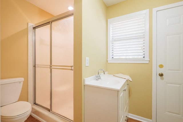 3564 River Chase Dr, Valdosta, GA 31602 - bathroom featuring a shower stall, toilet, and vanity
