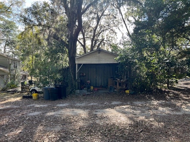 exterior space featuring an outbuilding