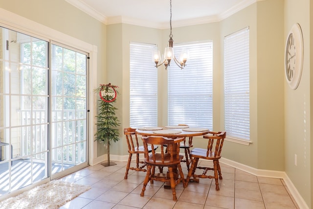 tiled dining area featuring ornamental molding and an inviting chandelier