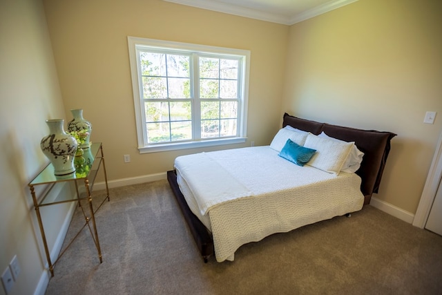 bedroom featuring baseboards, carpet floors, and ornamental molding