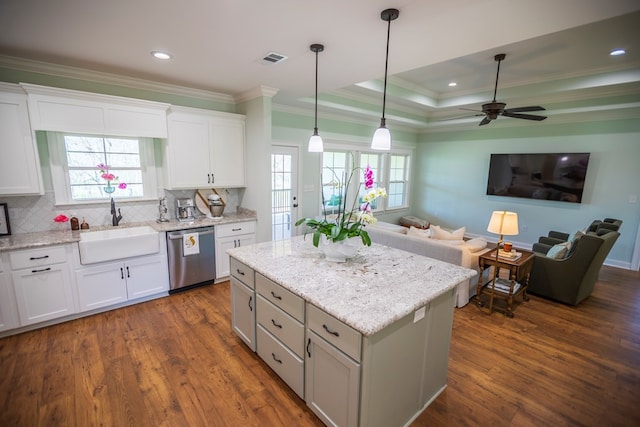 kitchen with a sink, dark wood-type flooring, dishwasher, and open floor plan