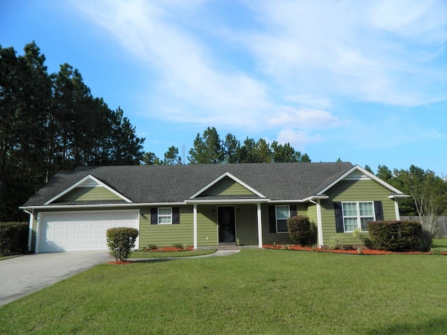 ranch-style house with a garage and a front lawn