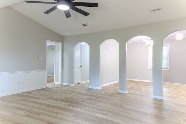 4604 Pinebrook Dr, Lake Park, GA 31636 - empty room featuring a ceiling fan, vaulted ceiling, light wood-style floors, and arched walkways