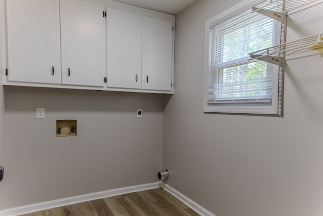 4604 Pinebrook Dr, Lake Park, GA 31636 - washroom with hookup for a washing machine, electric dryer hookup, wood finished floors, and cabinet space
