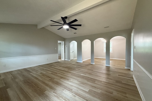 4604 Pinebrook Dr, Lake Park, GA 31636 - unfurnished living room featuring ceiling fan, arched walkways, and wood finished floors