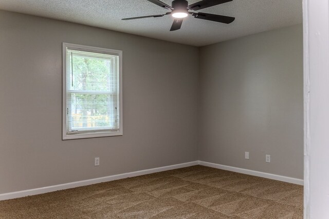 4604 Pinebrook Dr, Lake Park, GA 31636 - spare room with dark colored carpet, a ceiling fan, and a textured ceiling