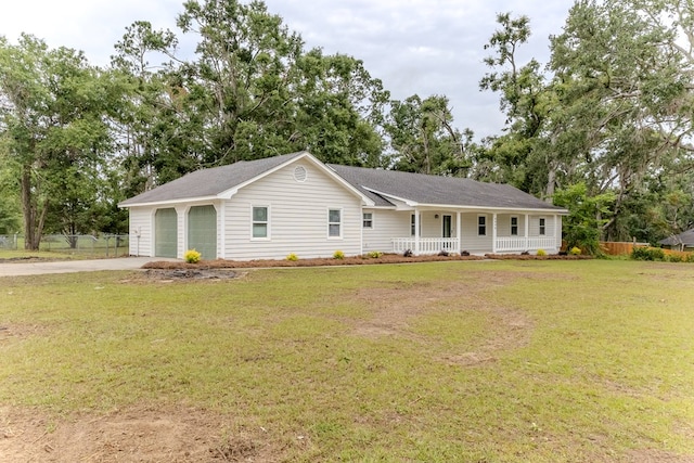 4604 Pinebrook Dr, Lake Park, GA 31636 - ranch-style house featuring a porch and a detached garage