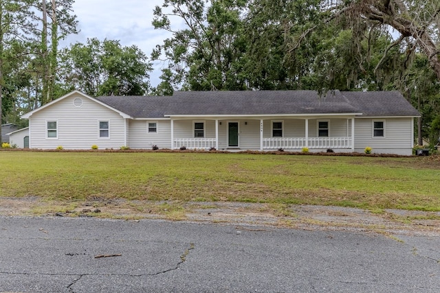 4604 Pinebrook Dr, Lake Park, GA 31636 - ranch-style house featuring a porch and a front yard