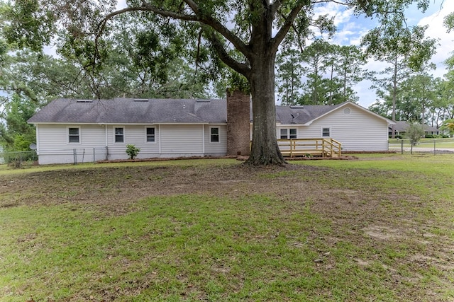 4604 Pinebrook Dr, Lake Park, GA 31636 - back of property featuring a chimney and a wooden deck