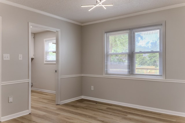 4604 Pinebrook Dr, Lake Park, GA 31636 - spare room with light wood-style floors, ornamental molding, and a textured ceiling