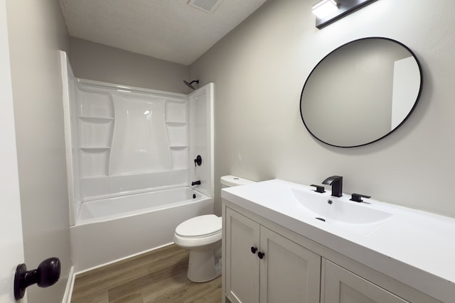 4604 Pinebrook Dr, Lake Park, GA 31636 - full bathroom with wood finished floors, vanity, shower / washtub combination, and a textured ceiling