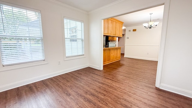 17 Ard Rd, Ray City, GA 31645 - unfurnished living room featuring a chandelier, dark wood-style floors, crown molding, and baseboards