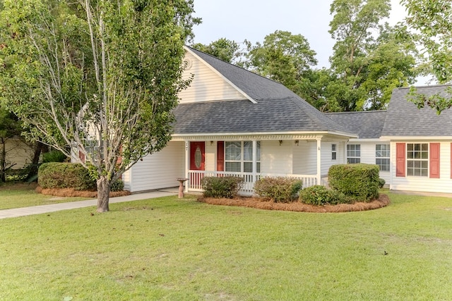 17 Ard Rd, Ray City, GA 31645 - view of front of home featuring a porch, a front yard, and roof with shingles