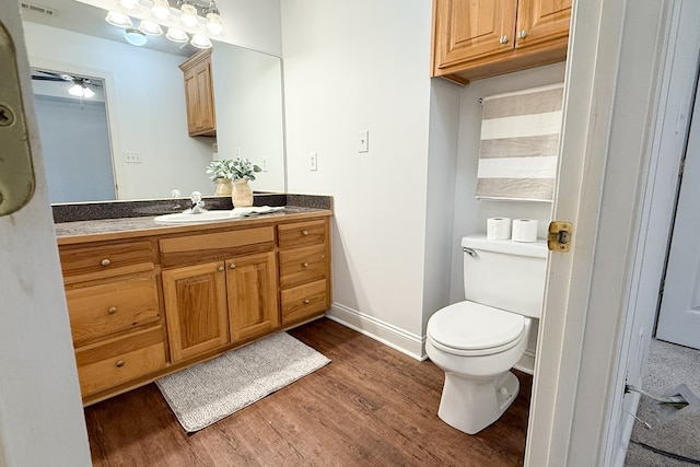 17 Ard Rd, Ray City, GA 31645 - bathroom with vanity, wood finished floors, toilet, and baseboards