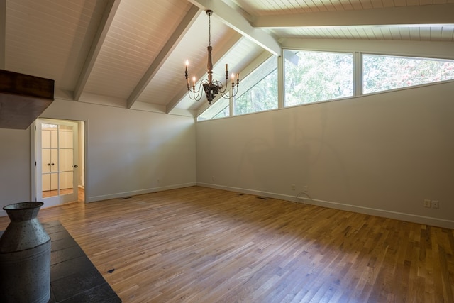 additional living space featuring vaulted ceiling with beams, an inviting chandelier, and hardwood / wood-style flooring